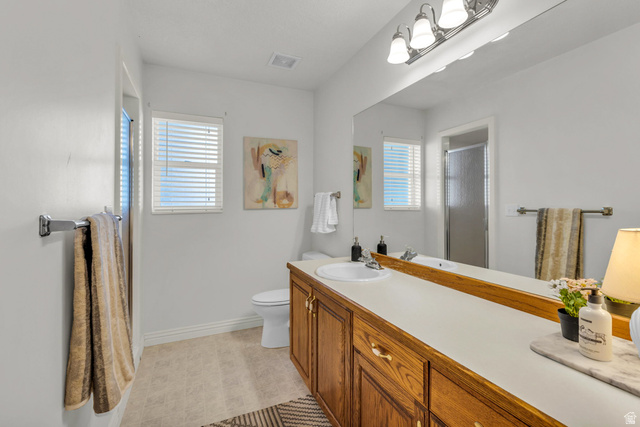 1060 West 2620th Street South Mapleton, UT 84664 - Photo 35 of 87 Full bath featuring a stall shower, vanity, and light floors