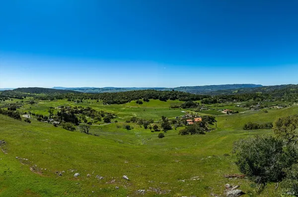 a view of a green field with lots of green space