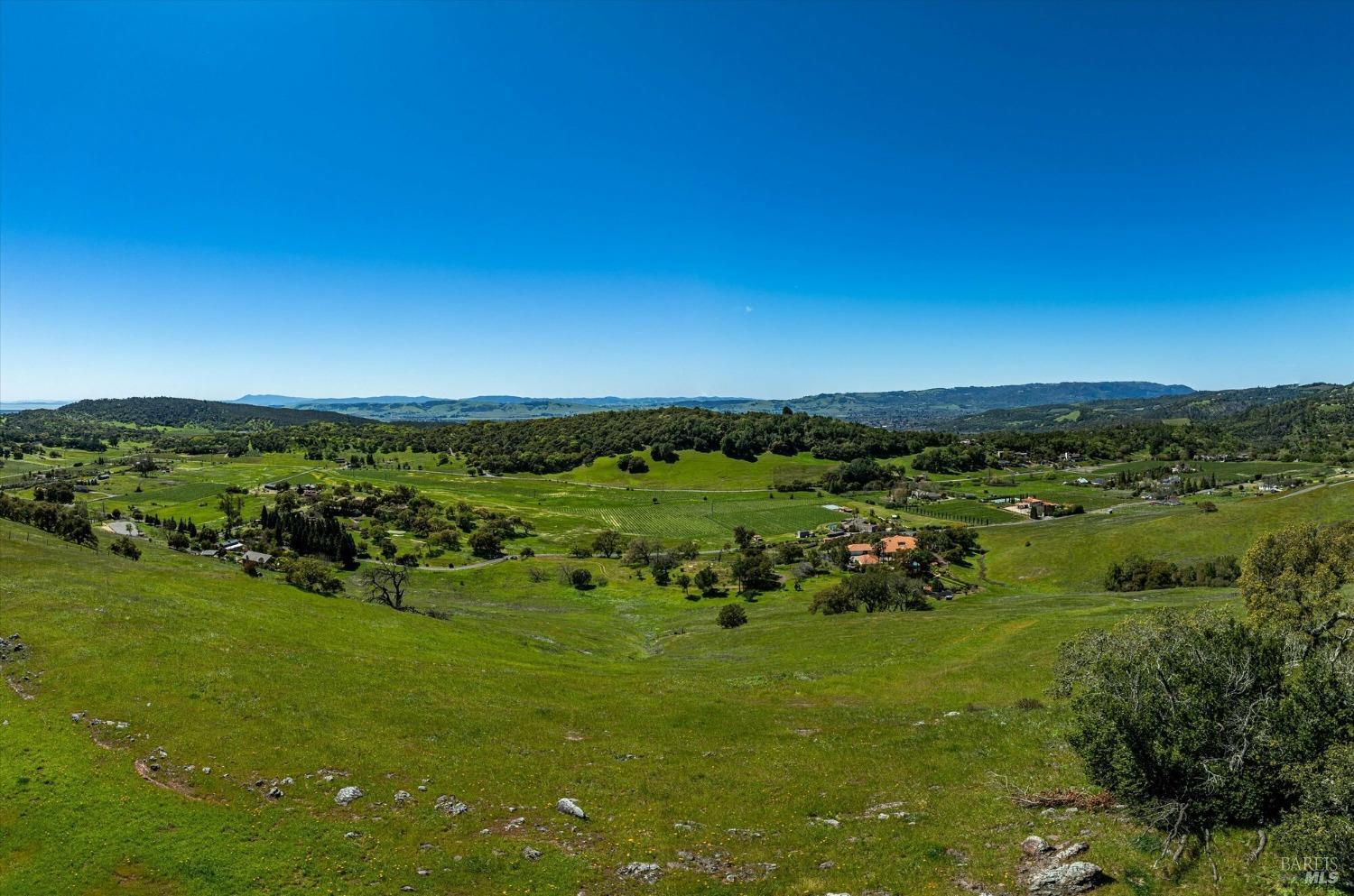 4500 Lovall Valley Loop Road Sonoma, CA 95476 - Photo 15 of 17 a view of a green field with lots of green space