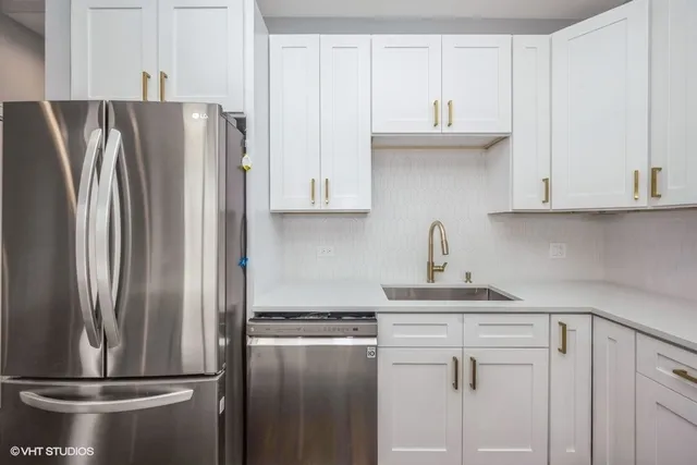 a view of wooden floor and windows in a room
