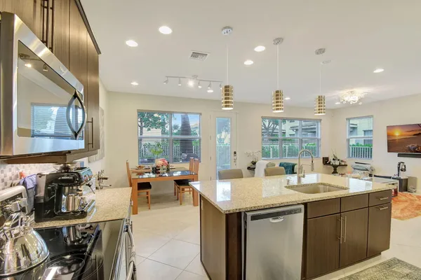 a room with sink attached with living room