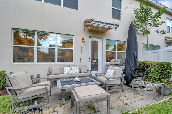a building outdoor space with patio furniture