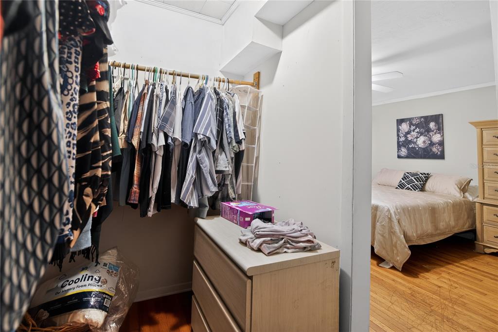 1803 Southeast 3rd Avenue Ocala, FL 34471 - Photo 14 of 29 a view of walk in closet with clothes and shoes
