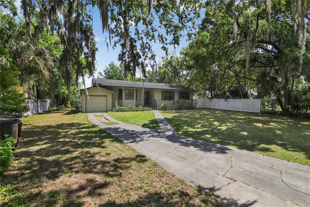 1803 Southeast 3rd Avenue Ocala, FL 34471 - Photo 2 of 29 a view of house with yard