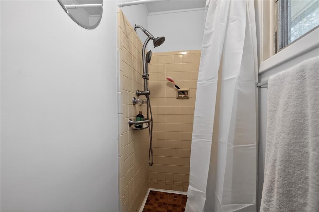 1803 Southeast 3rd Avenue Ocala, FL 34471 - Photo 21 of 29 a bathroom with a shower
