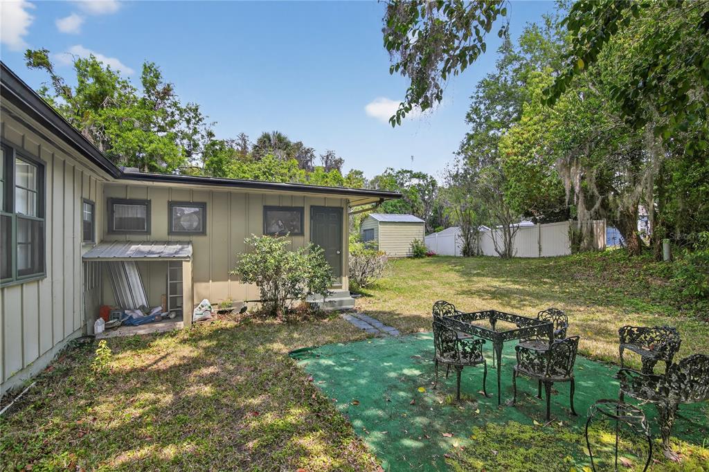1803 Southeast 3rd Avenue Ocala, FL 34471 - Photo 29 of 29 a view of a house with backyard and sitting area