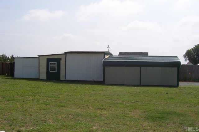 2168 Elevation Road Four Oaks, NC 27524 - Photo 8 of 9 2 car metal carport and plenty of storage buildings Other
