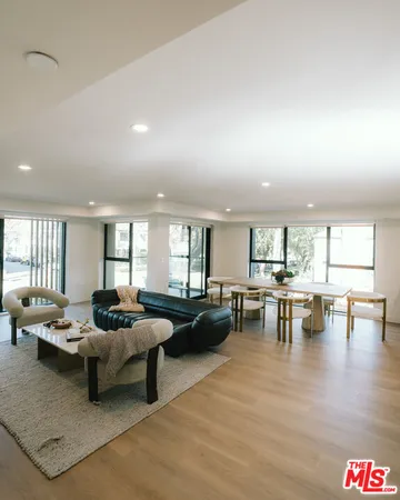 a lobby with furniture and window