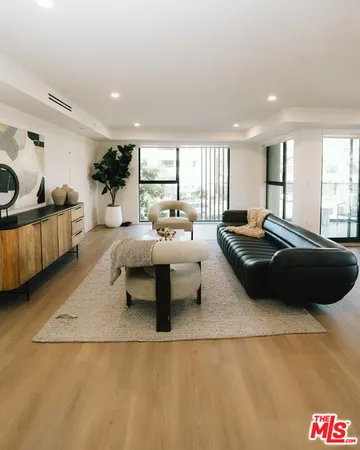 a living room with furniture and a couch