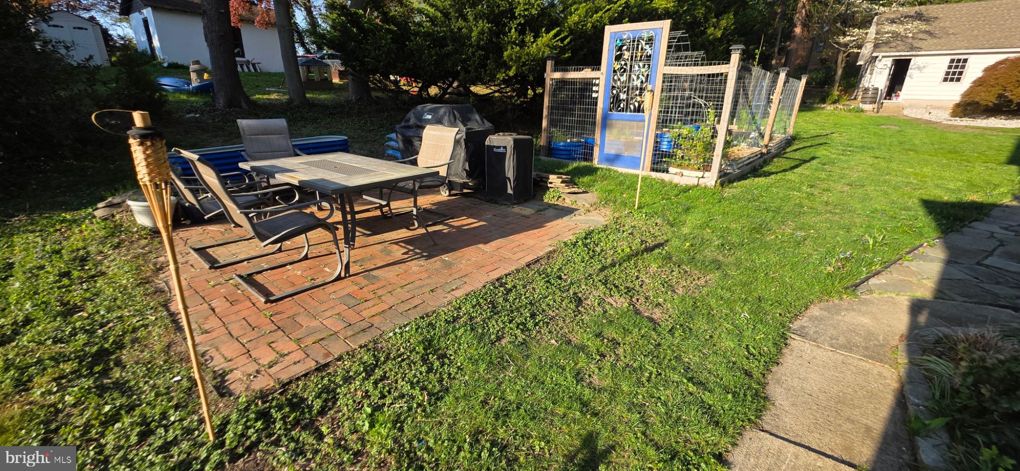 443 High Street Mount Holly, NJ 08060 - Photo 15 of 42 Charming outdoor retreat with greenery.