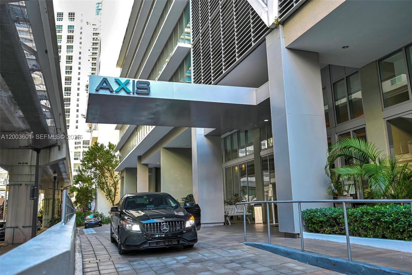 1111 Southwest 1st Avenue, Unit 2223N Miami, FL 33130 - Photo 1 of 39 a car parked in front of a building