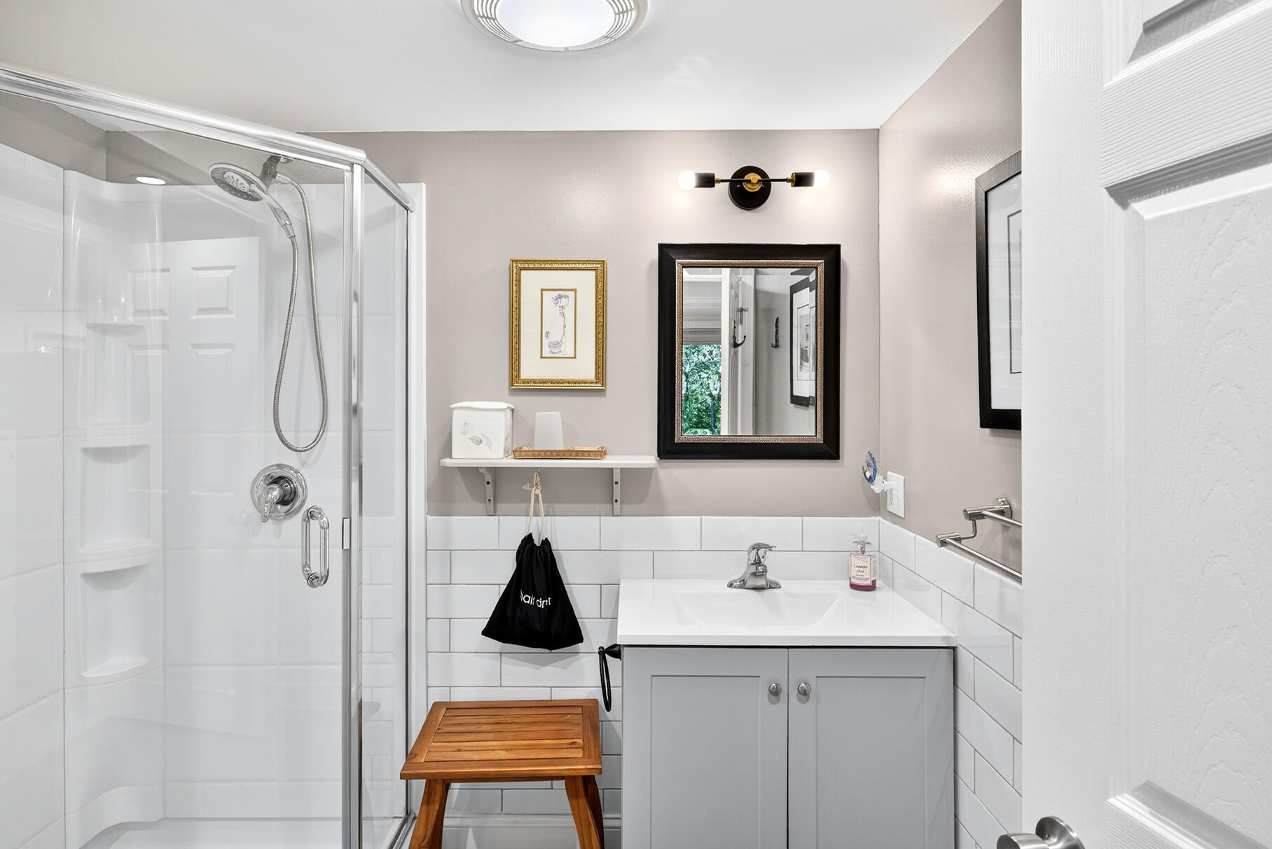 11 Whelpley Road Eastham, MA 02642 - Photo 31 of 37 a bathroom with a sink and a mirror