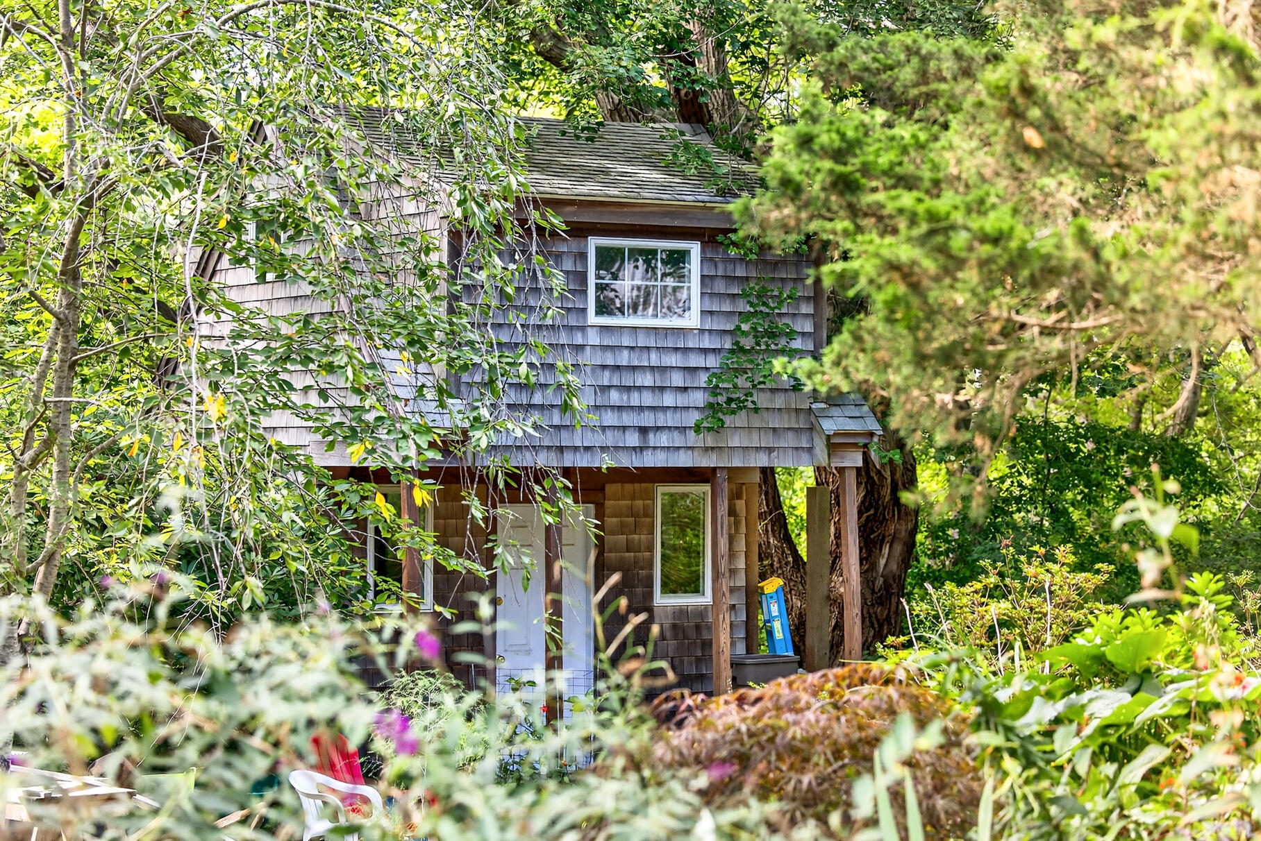 11 Whelpley Road Eastham, MA 02642 - Photo 34 of 37 front view of a house with a tree