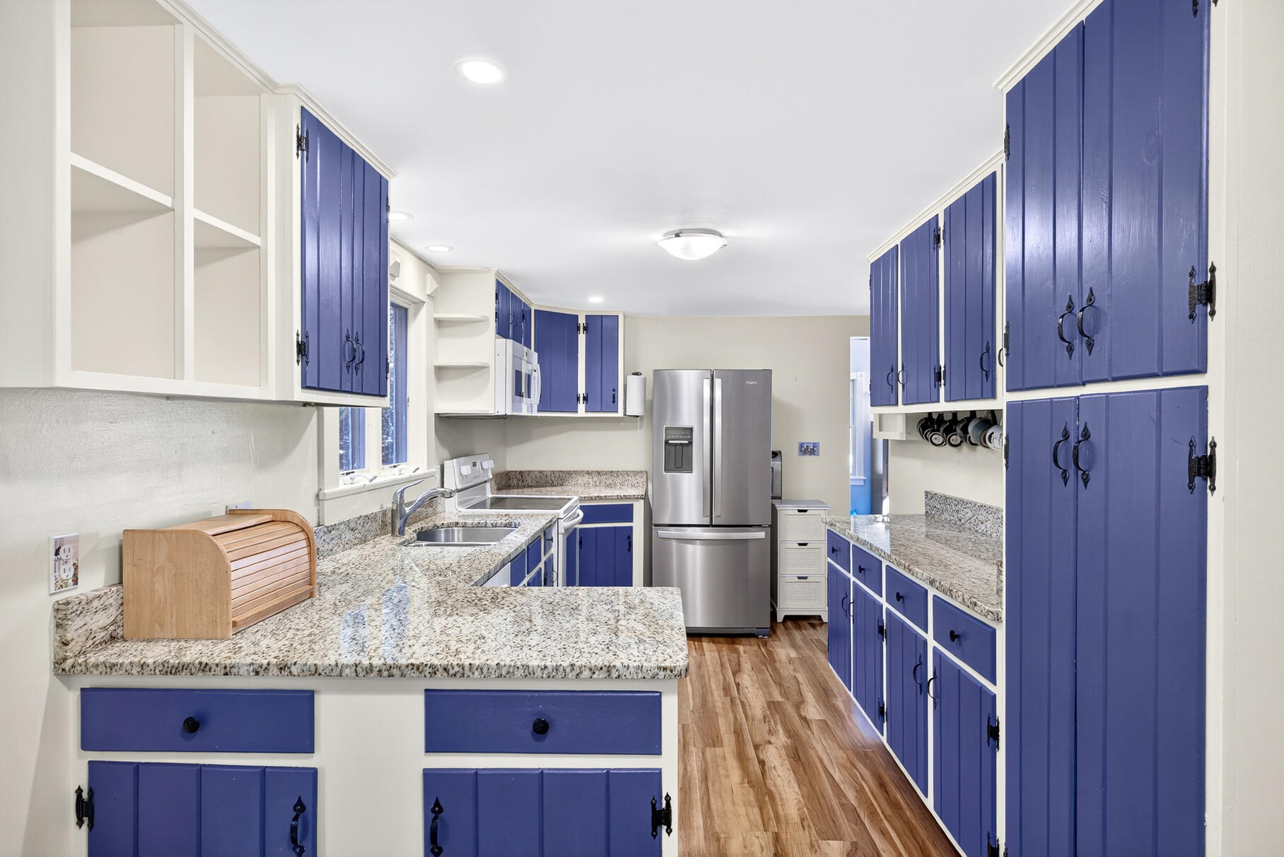 11 Whelpley Road Eastham, MA 02642 - Photo 5 of 37 a kitchen with stainless steel appliances granite countertop wooden cabinets a sink and dishwasher