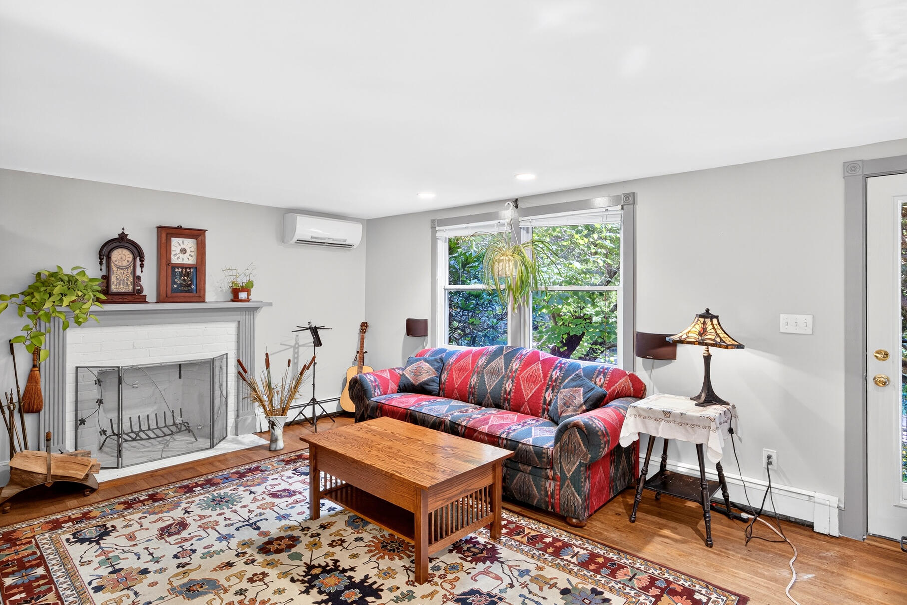 11 Whelpley Road Eastham, MA 02642 - Photo 8 of 37 a living room with furniture and a fireplace