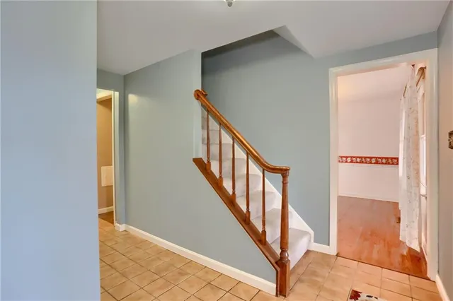 a view of an entryway with staircase