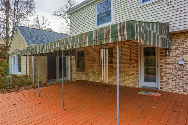 a backyard of a house with seating space