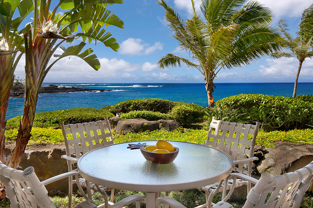 2640 Puuholo Road, Unit 212 Koloa, HI 96756 - Photo 1 of 10 a table with chairs and a table