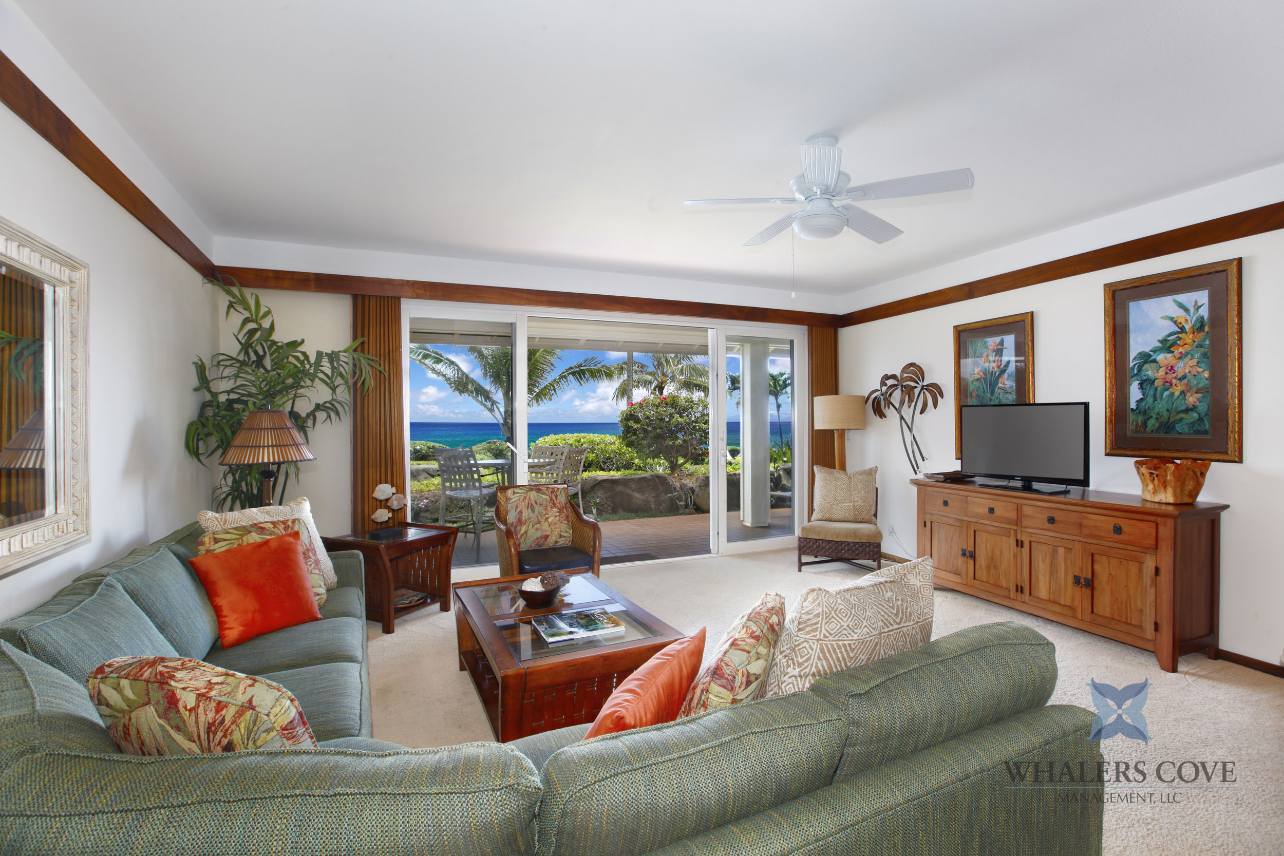 2640 Puuholo Road, Unit 212 Koloa, HI 96756 - Photo 5 of 10 a living room with furniture and a large window