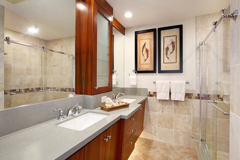 2640 Puuholo Road, Unit 212 Koloa, HI 96756 - Photo 8 of 10 a bathroom with a granite countertop sink mirror and a