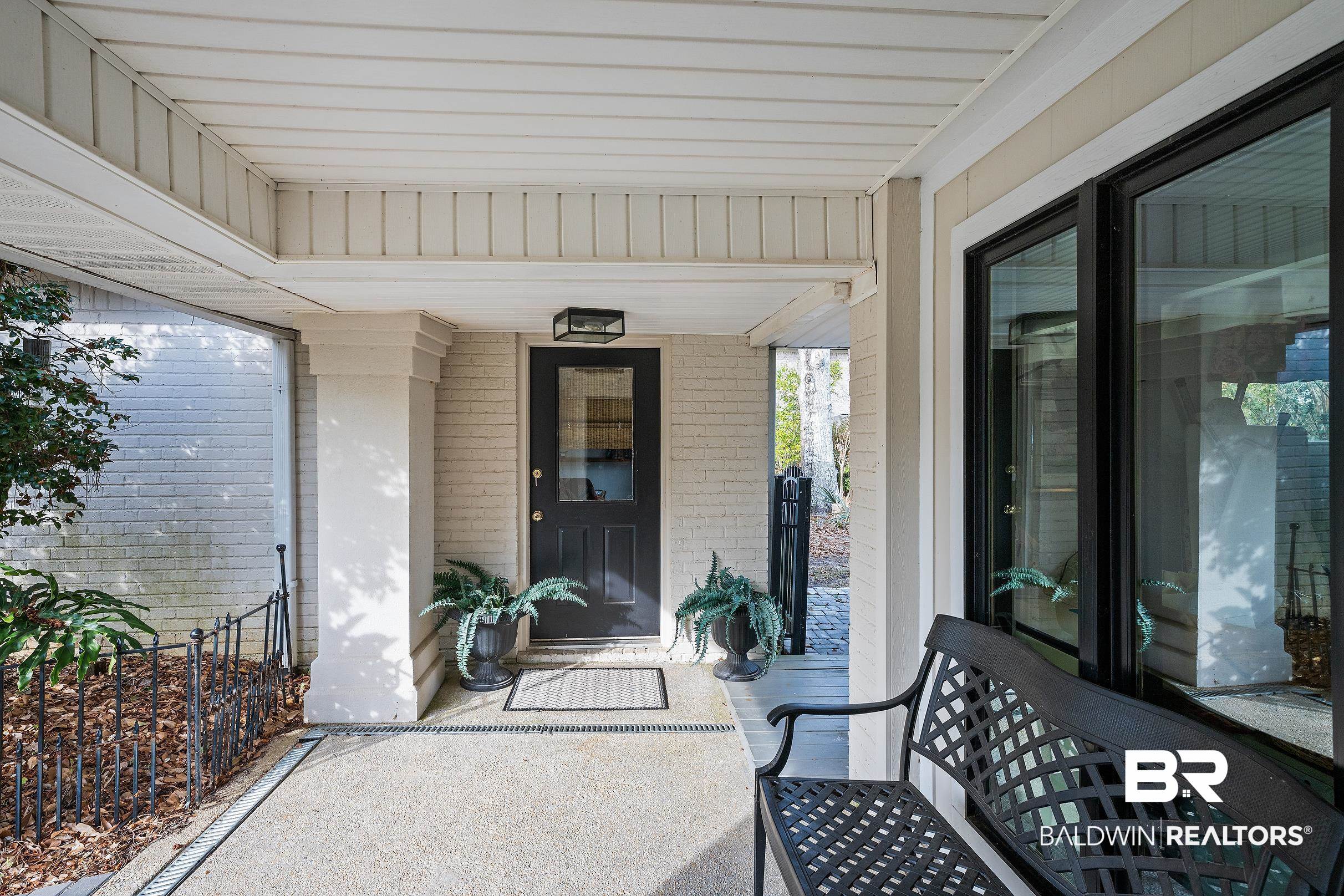 8490 Bay View Drive Foley, AL 36535 - Photo 45 of 67 Entrance to property featuring brick siding and a porch