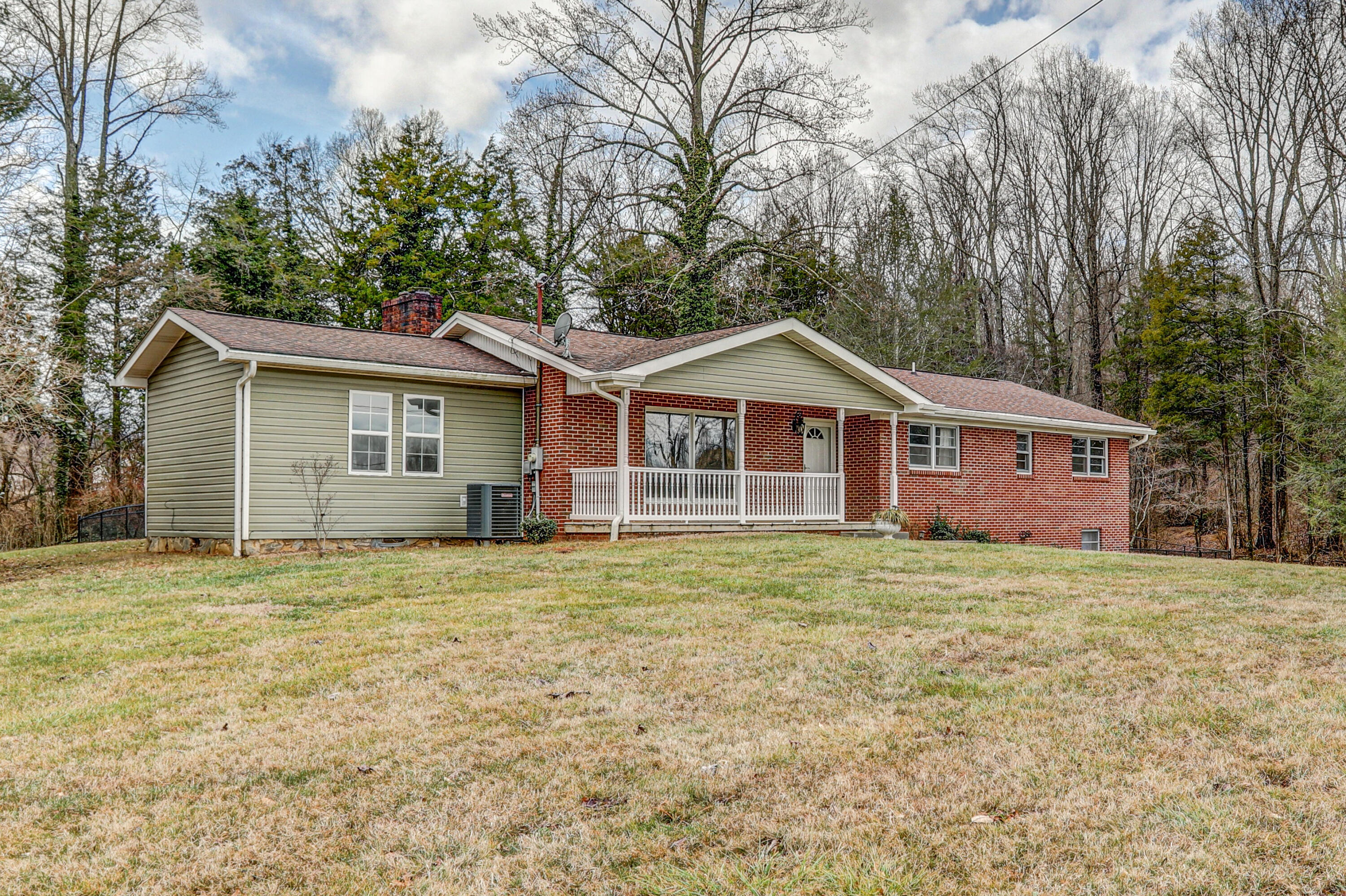 213 Poplar Ridge Road Piney Flats, TN 37686 - Photo 2 of 60 B42A9395_6_7_8_9-2