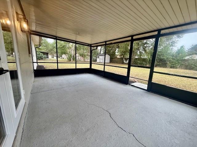 1819 Oak Street DeLand, FL 32724 - Photo 23 of 26 an empty room with large windows