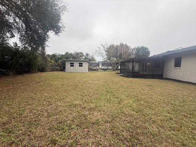 1819 Oak Street DeLand, FL 32724 - Photo 25 of 26 a view of a terrace with yard