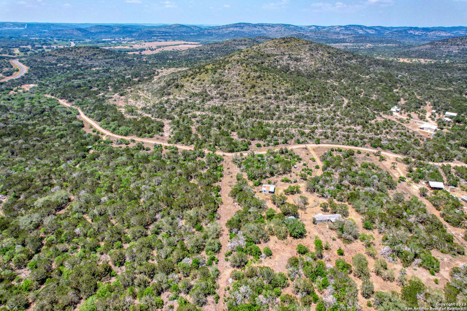 0 Brushy Creek Ranch Road Concan, TX 78838 - Photo 19 of 27 an aerial view of residential house and outdoor space