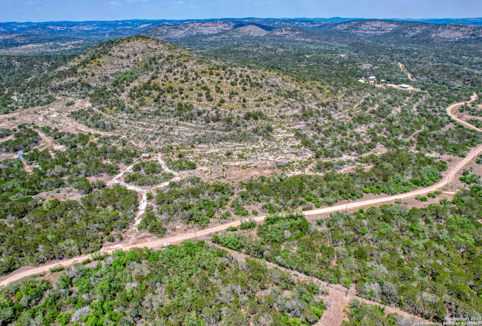 0 Brushy Creek Ranch Road Concan, TX 78838 - Photo 21 of 27 a view of a forest with a mountain