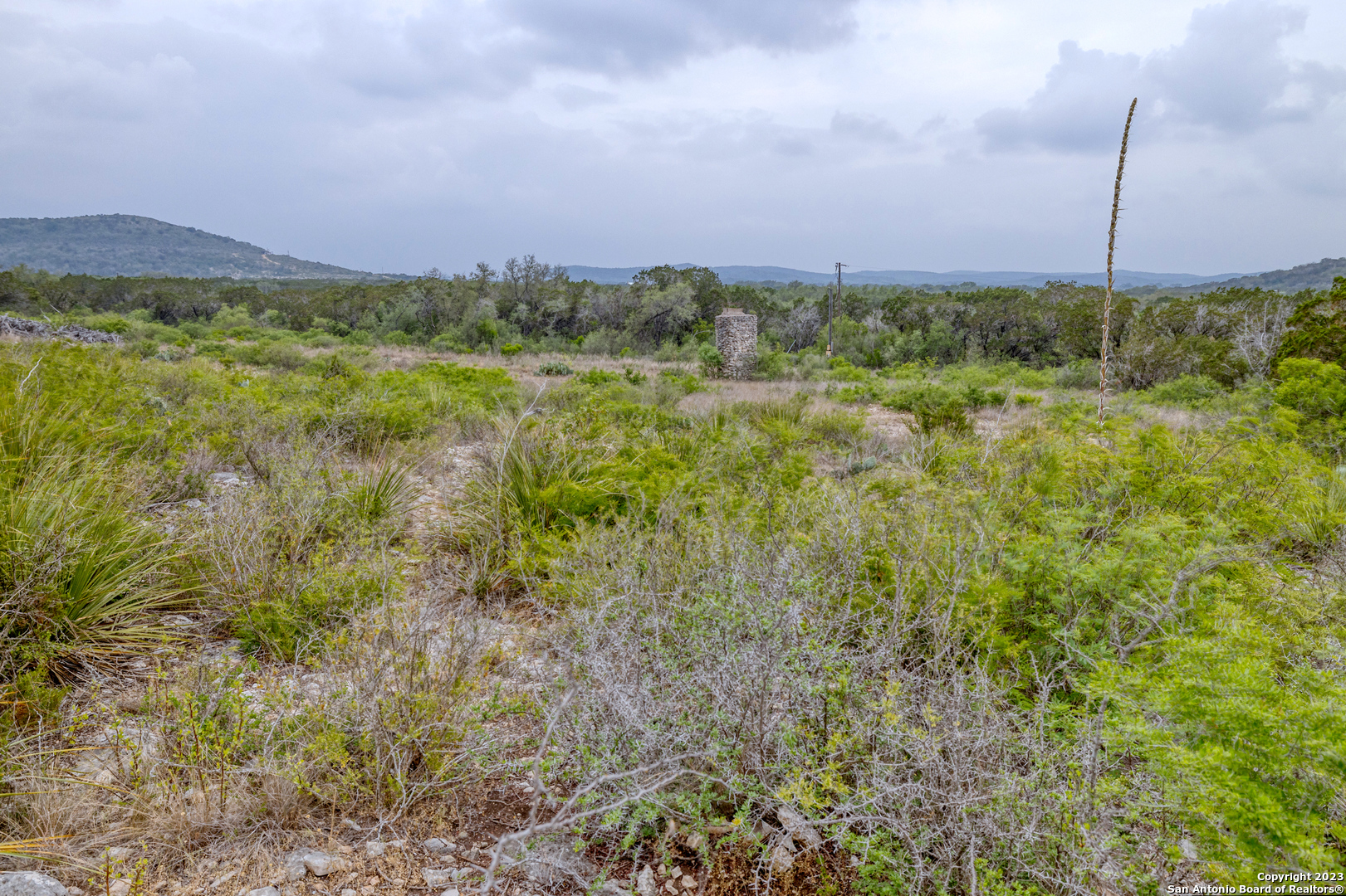 0 Brushy Creek Ranch Road Concan, TX 78838 - Photo 7 of 27 a view of a city with lush green forest