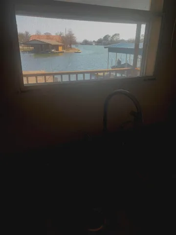 a close view of sink and a stove