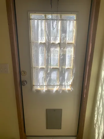 a view of balcony with wooden floor