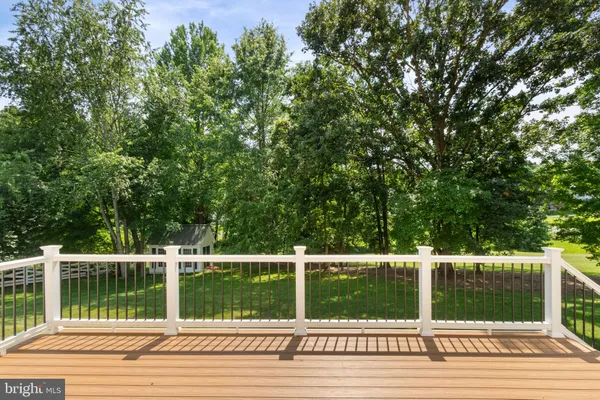 a view of a yard from a balcony
