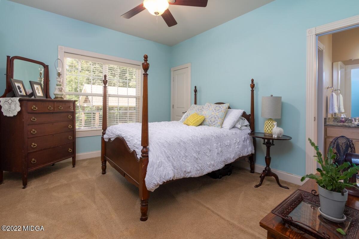 500 River Walk Forsyth, GA 31029 - Photo 20 of 31 a bedroom with a bed and a window