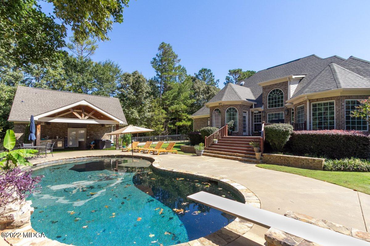 500 River Walk Forsyth, GA 31029 - Photo 25 of 31 a front view of a house with a yard