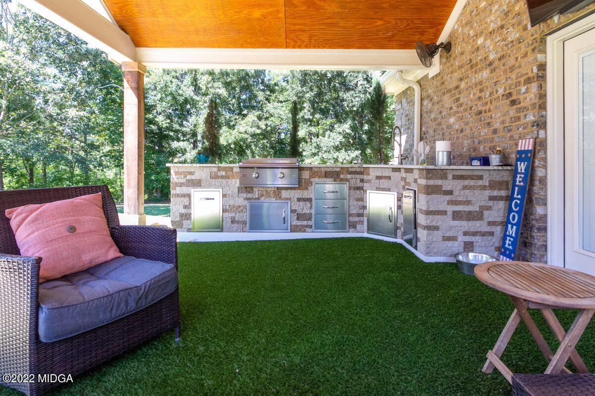 500 River Walk Forsyth, GA 31029 - Photo 26 of 31 a view of a chairs in backyard of the house