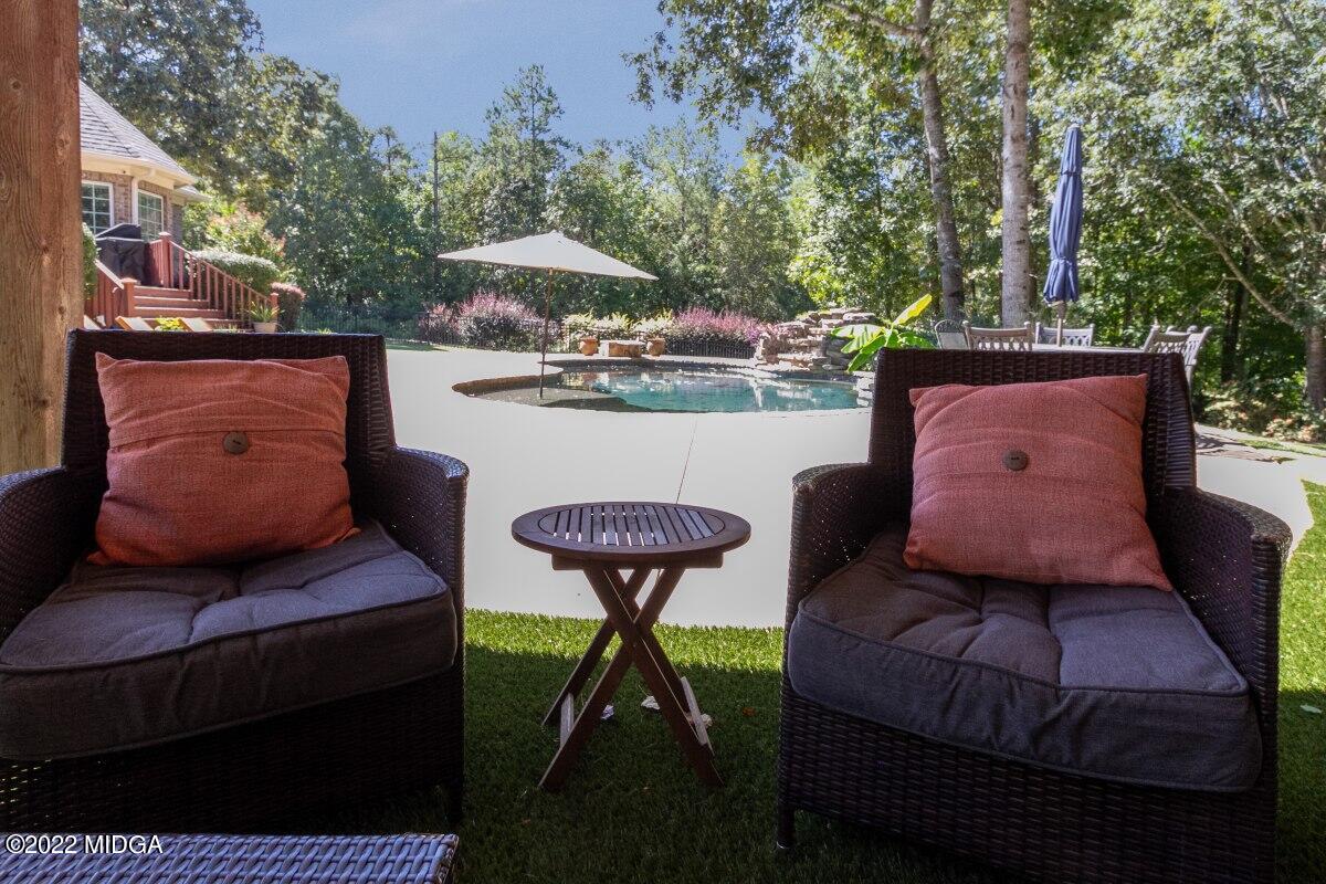 500 River Walk Forsyth, GA 31029 - Photo 27 of 31 a view of city from balcony with seating space