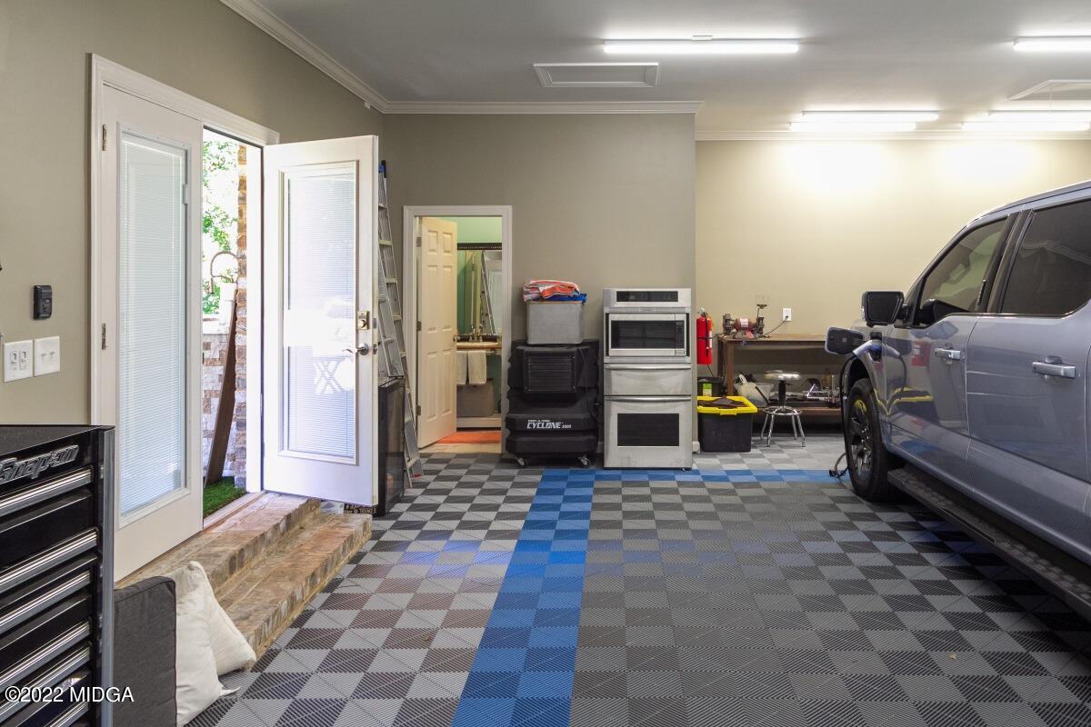 500 River Walk Forsyth, GA 31029 - Photo 29 of 31 a bedroom with furniture and a window