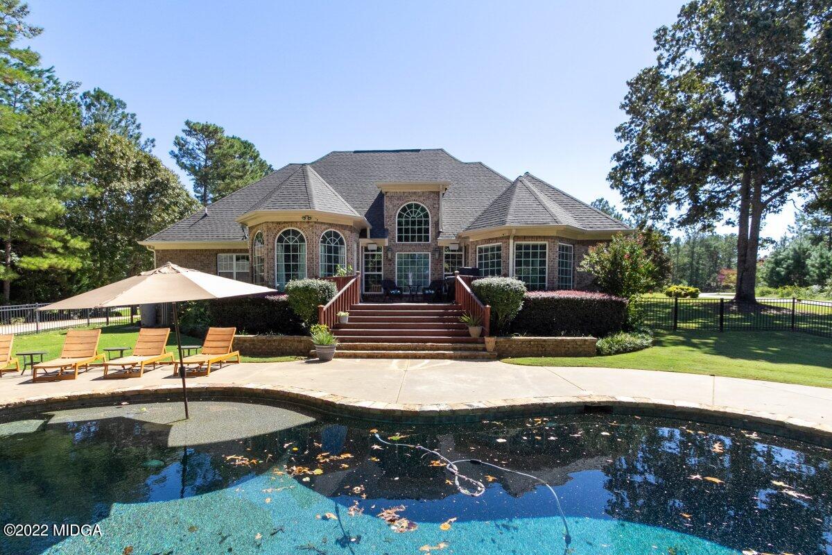 500 River Walk Forsyth, GA 31029 - Photo 30 of 31 a view of a house with pool yard and sitting area