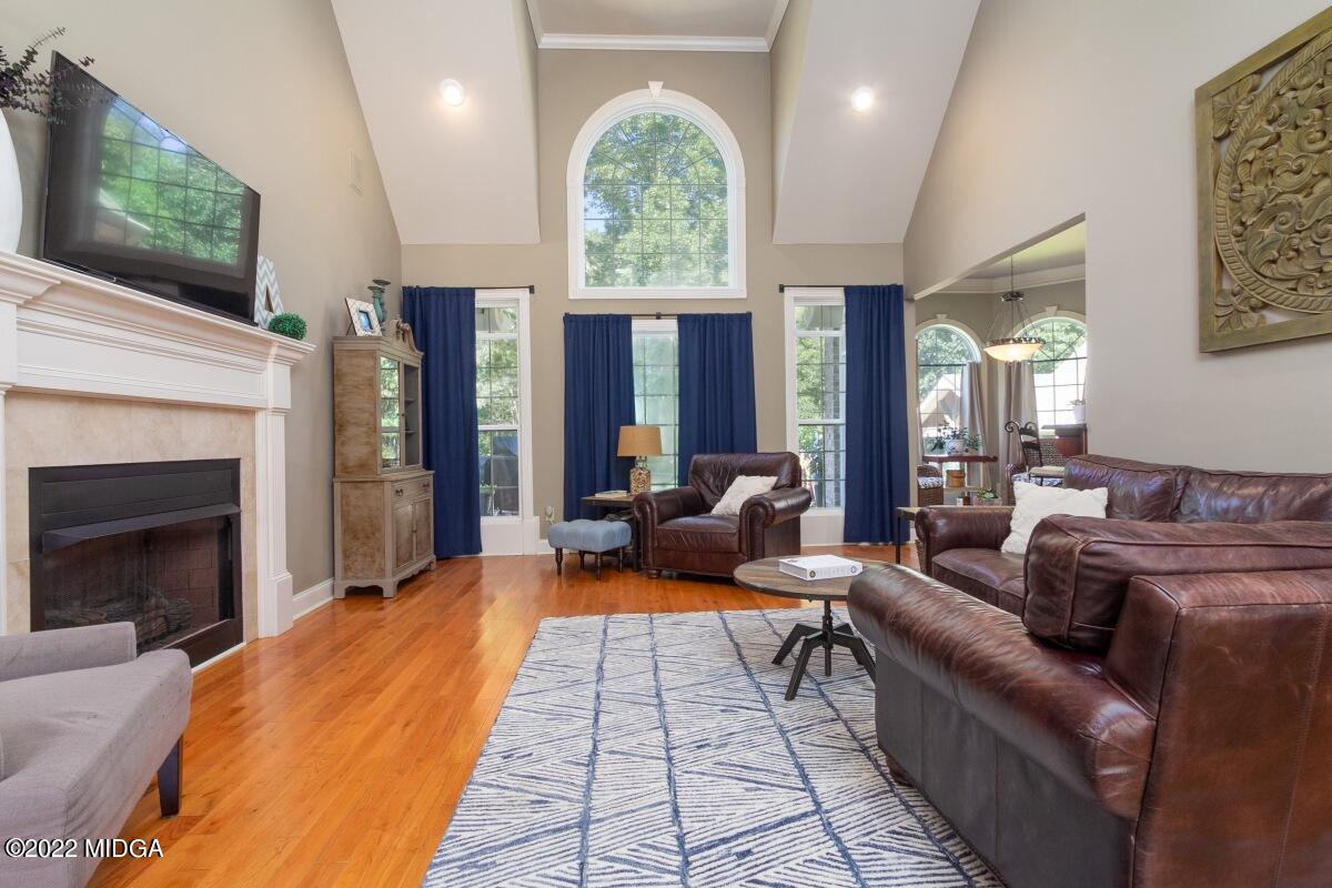 500 River Walk Forsyth, GA 31029 - Photo 6 of 31 a living room with furniture fireplace and flat screen tv