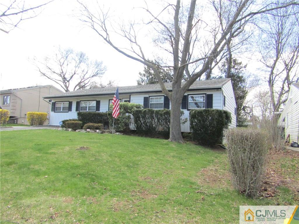 29 Villanova Road Old Bridge, NJ 08859 - Photo 22 of 24 a front view of a house with a garden