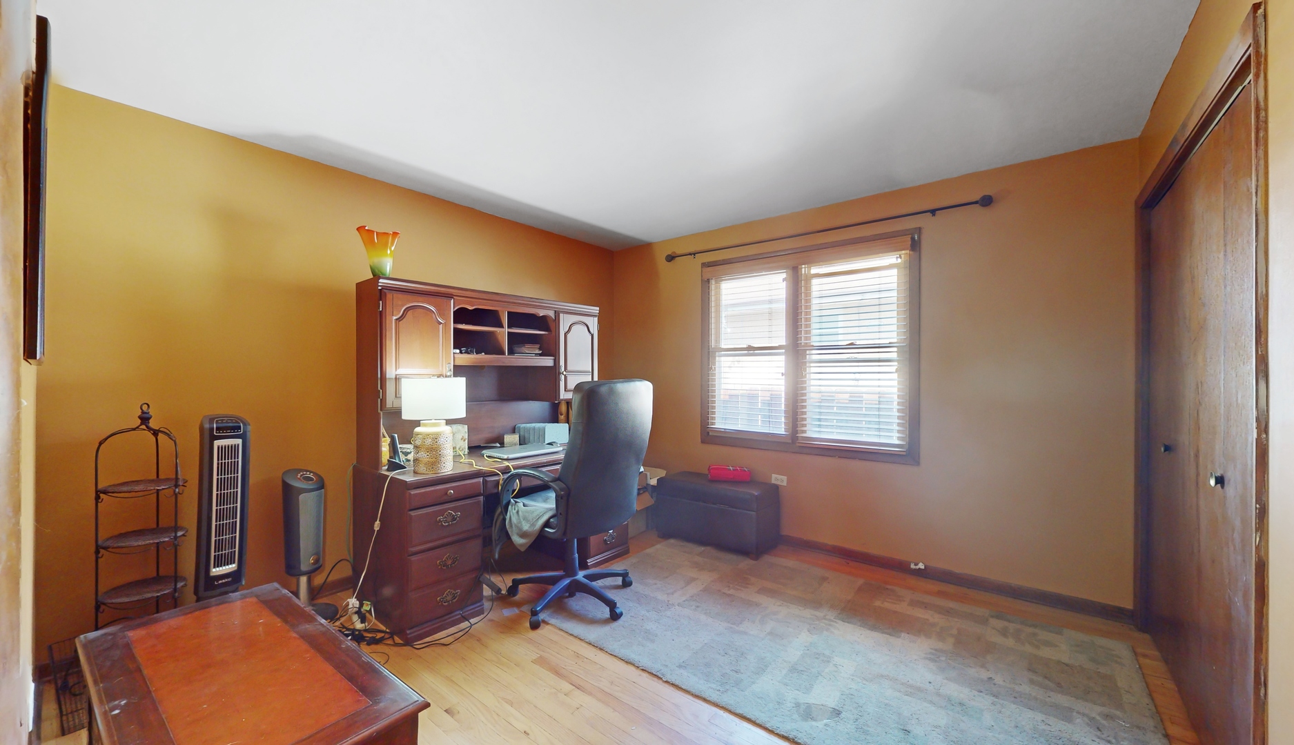 2105 16th Avenue Broadview, IL 60155 - Photo 11 of 26 a view of a workspace with furniture and a window