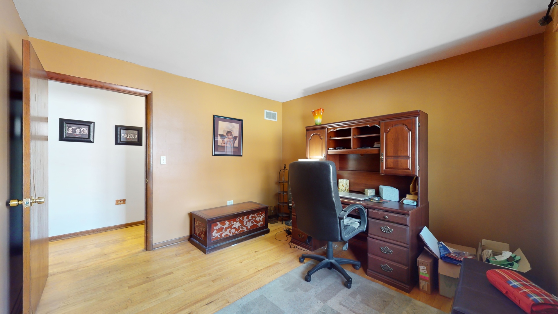 2105 16th Avenue Broadview, IL 60155 - Photo 12 of 26 a view of workspace with wooden floor windows