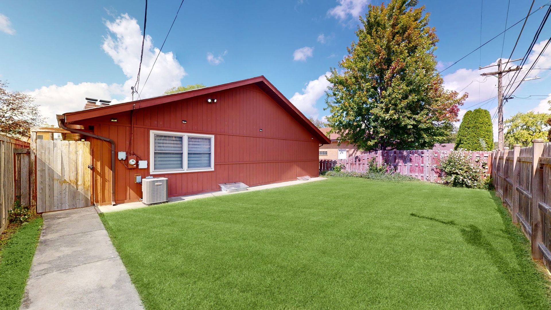 2105 16th Avenue Broadview, IL 60155 - Photo 22 of 26 a front view of a house with garden