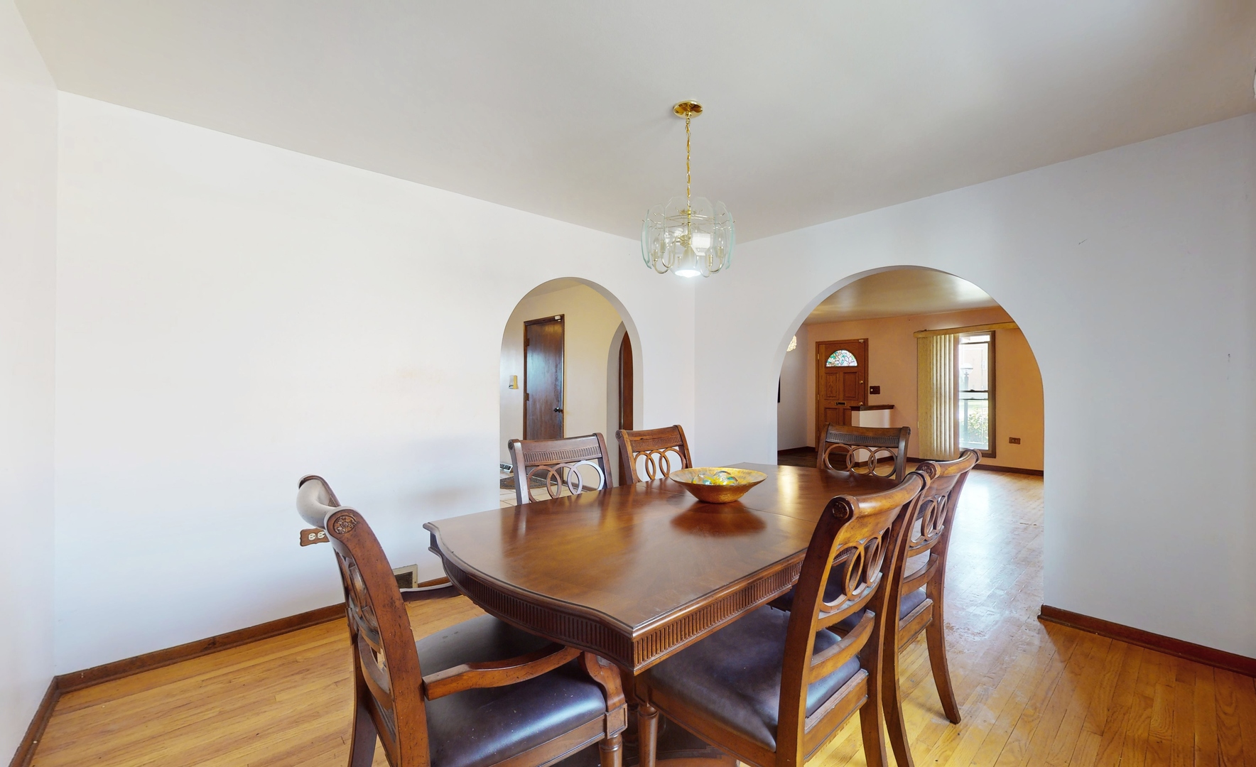 2105 16th Avenue Broadview, IL 60155 - Photo 6 of 26 a dining room with furniture and wooden floor
