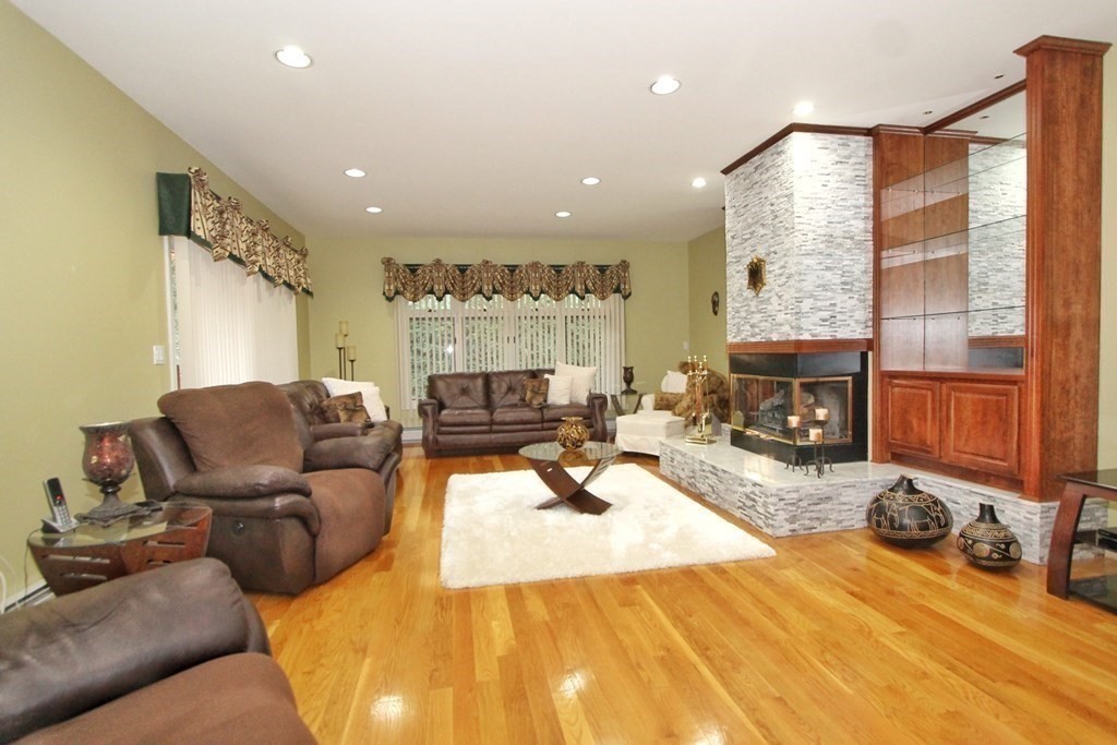 44 Whisper Drive Worcester, MA 01609 - Photo 11 of 40 a bed room with furniture window and a fireplace