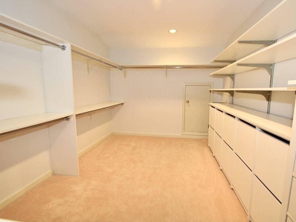 44 Whisper Drive Worcester, MA 01609 - Photo 22 of 40 a view of a room with racks on the wall