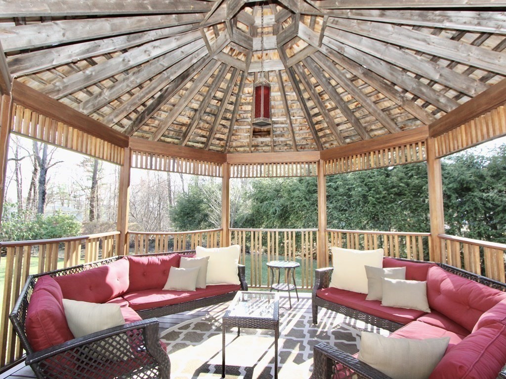 44 Whisper Drive Worcester, MA 01609 - Photo 34 of 40 a roof deck with couches and wooden floor