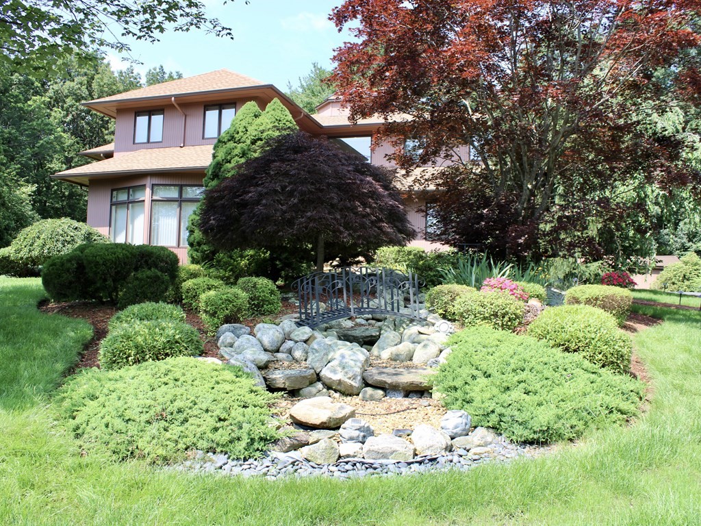 44 Whisper Drive Worcester, MA 01609 - Photo 39 of 40 a front view of a house with a yard